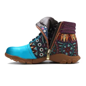 Detail of bohemian retro women's ankle boots featuring colorful ethnic fabric patterns