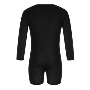 Vista posterior de un body negro de manga larga confeccionado en suave tejido texturizado