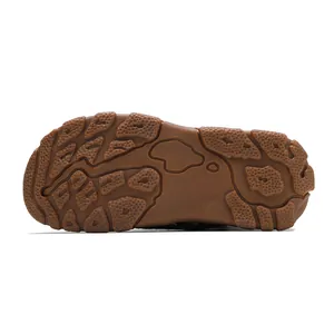 Close-up of the durable brown rubber outsole with a rugged non-slip grip for casual boots