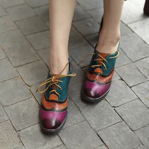Detailed view of vintage genuine leather color-block Brogue oxfords with chunky heels