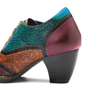 Close-up detail of vintage colorful leather patchwork Brogue shoe with thick high heel