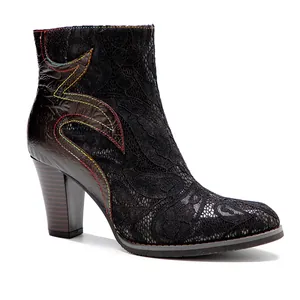 Detailed side view of black lace vintage boots with colorful stitching and block heel