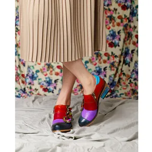 Vintage color-block leather brogues featuring floral ornaments and comfortable chunky heel