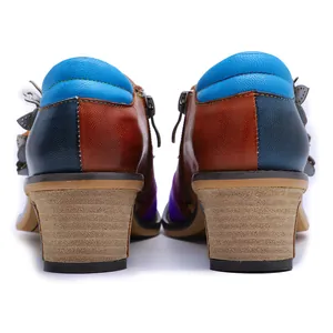 Rear view of vintage color-block block heel leather shoes featuring textured wooden heels