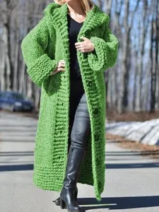 Stylish women's long green chunky knit hooded cardigan coat with a cozy loose fit