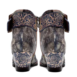 Detailed back view of vintage Chinese style boots with landscape texture and floral heel