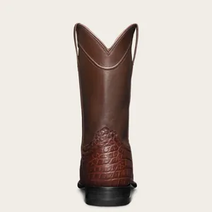 Vue arrière détaillée de bottes de cowboy en cuir marron avec talon texture crocodile