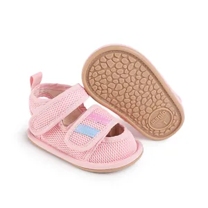 Detailed view of pink mesh baby pre-walker sandals with non-slip patterned sole
