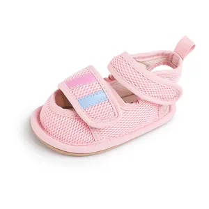 Close-up of pink mesh baby walking shoe with adjustable Velcro straps for 0-1 year old