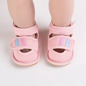 Close-up detail of pink breathable mesh baby walking shoes with adjustable velcro straps