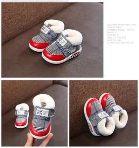 Plaid baby winter snow boots with warm faux fur lining and non-slip rubber soles