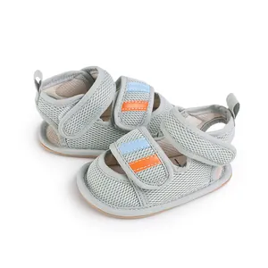 Light green breathable mesh baby walking shoes with adjustable blue and orange straps