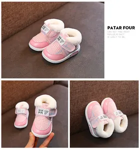 Toddler pink plaid snow boots with warm white faux fur lining and adjustable Velcro straps