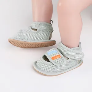 Detailed view of breathable mesh baby walking shoes with velcro straps