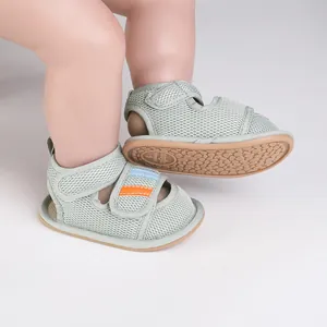 Detailed view of breathable mesh baby pre-walker sandals with non-slip soles.