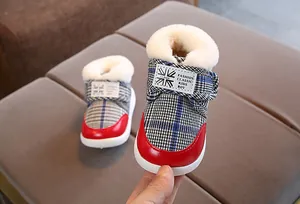 Classic plaid toddler snow boots with extra warm plush lining and Velcro closure