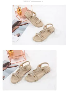 Lifestyle view of bohemian flat sandals with rhinestone accents and elastic strap