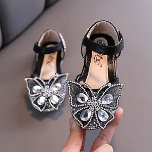 Chaussures princesse noires pour filles avec décoration papillon en strass