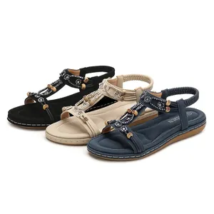 Ladies bohemian rhinestone flat sandals available in black, beige and navy blue colors