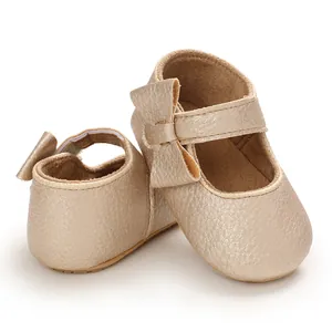 Gold soft sole baby princess walking shoes with decorative bow detail