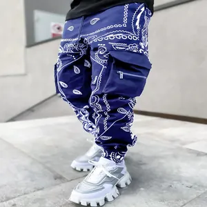 Blue paisley cargo harem pants for men featuring a relaxed streetwear multi-pocket fit