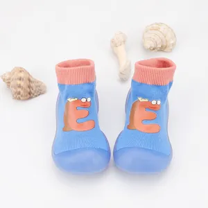 Breathable blue baby walking sock shoes with soft rubber soles and cute cartoon 'E' design