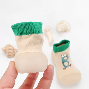 Detail view of breathable baby walker sock shoes with a flexible soft sole for infants.
