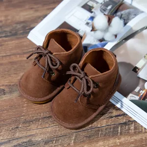 Warm brown suede baby boots with non-slip soft rubber soles for infant walking steps