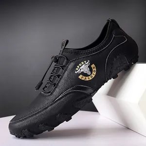 Klassische schwarze Herren-Leder-Slipper mit Oktopus-Sohle und Stierkopf-Logo