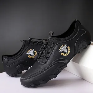 Retro-Loafer für Herren mit Oktopus-Gummisohle und dekorativem Stierkopf-Logo-Aufdruck.