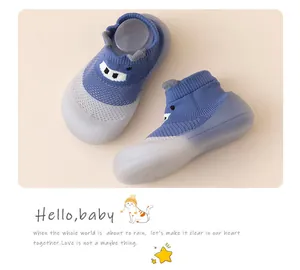 Detail of breathable blue baby mesh walking shoes with cute cartoon face