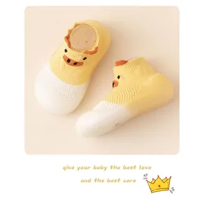 Detail of breathable yellow cartoon duck baby mesh walking socks with soft sole