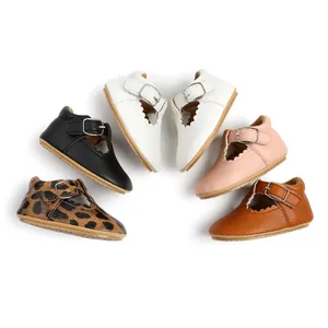 Baby Mary Jane shoes with scalloped edges and buckle straps in multiple colors and patterns.