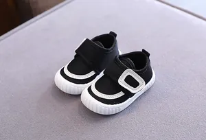 Close-up of black breathable mesh baby pre-walker shoes with soft anti-slip soles