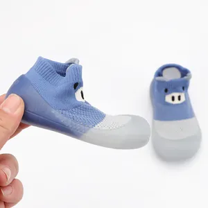 Breathable mesh baby sock shoe detail with cute cartoon face and soft translucent sole
