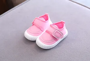 Detailed view of pink breathable mesh baby walking shoes featuring soft non-slip soles