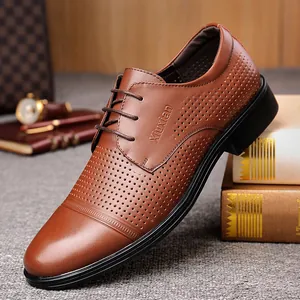 Classic brown leather perforated men's dress shoes with lace-up design for summer leisure