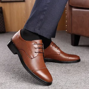 Men's brown perforated leather business dress shoes with a breathable lace-up design