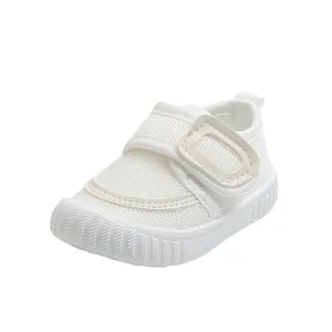 White mesh baby walking shoes with soft sole and hook-and-loop strap.