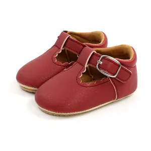 Red leather baby princess walker shoes with T-strap buckle and scalloped edge detail.