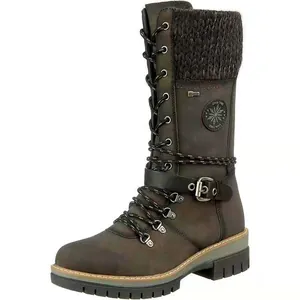 Detail of women's mid-calf winter boots with knitted patchwork and buckle
