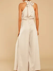 Eleganter schulterfreier Neckholder-Jumpsuit mit weitem Bein und Rückenschleife in Creme