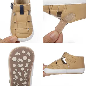 Detail view of brown baby walking sandals with soft soles and velcro straps