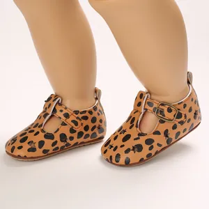 Close-up of leopard print PU leather baby pre-walker shoes with star cutouts