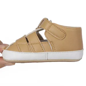 Side profile of tan baby leather walker sandals with white rubber sole