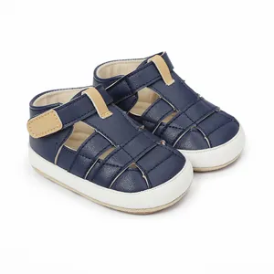 Detailed view of breathable dark blue baby walker sandals with adjustable velcro straps