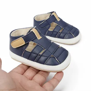 Close-up of navy blue breathable baby sandals designed for infants aged 3-12 months