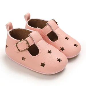 Detailed close-up of pink PU leather baby pre-walker shoes featuring cute star cutouts