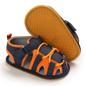 Sandali morbidi per neonati in blu navy e arancione per i primi passi