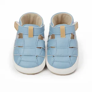 Close-up of light blue breathable baby sandals for newborns and toddlers with velcro straps